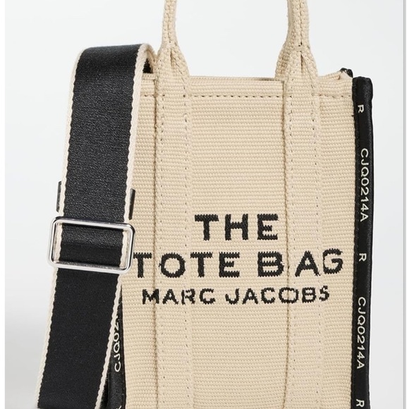 Marc Jacobs Handbags - Marc Jacobs Beige Jacquard Crossbody Tote Bag “NEW”
In original packaging ‼️